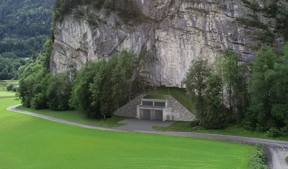 Imagen representativa de la entrada de un bunker en un monte suizo